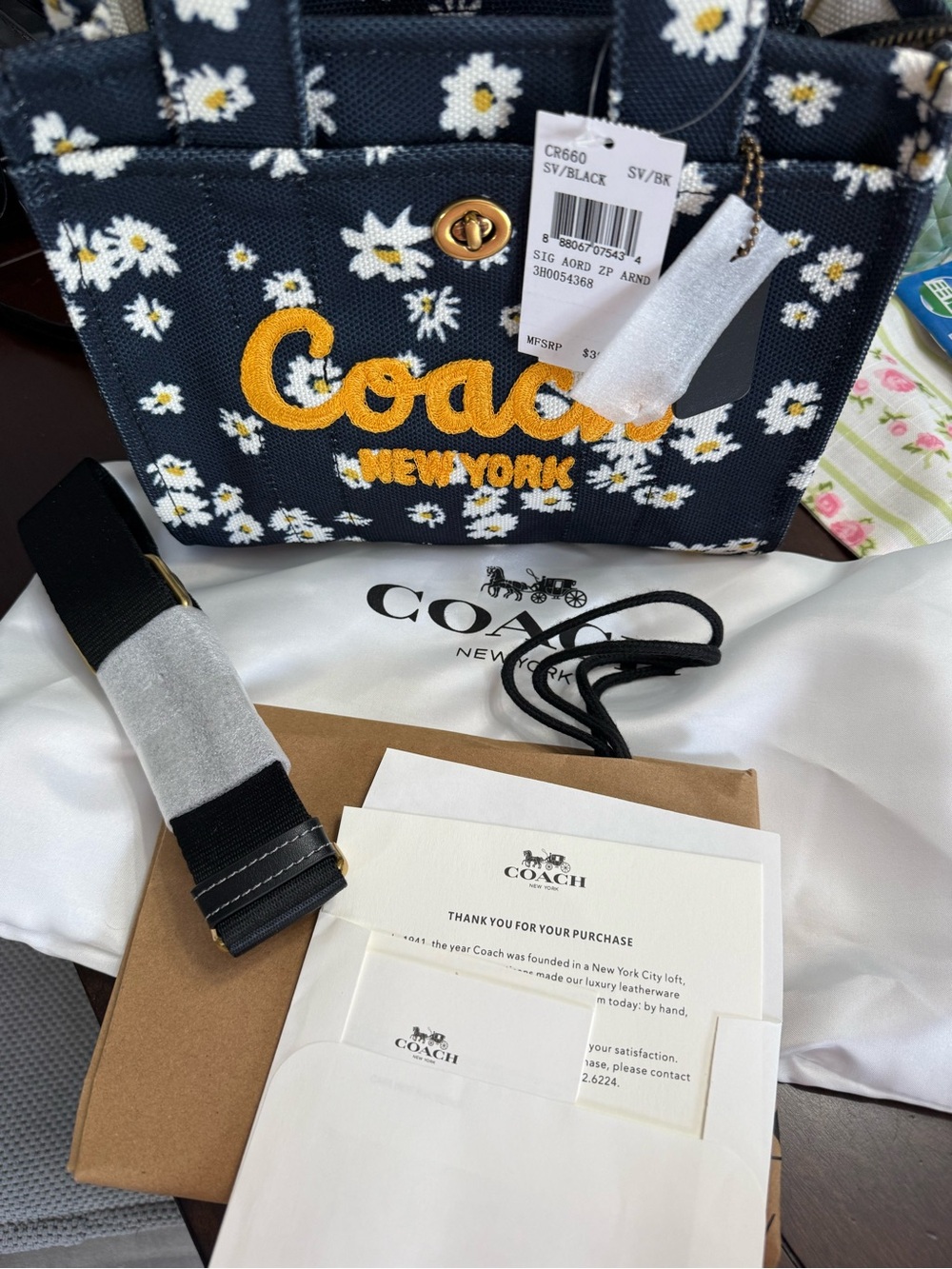 Coach Black and White Daisy Canvas Medium tote with crossbody strap - Picture 1 of 3